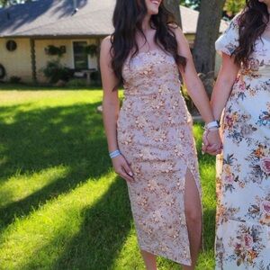 formal floral dress with open back and leg slit